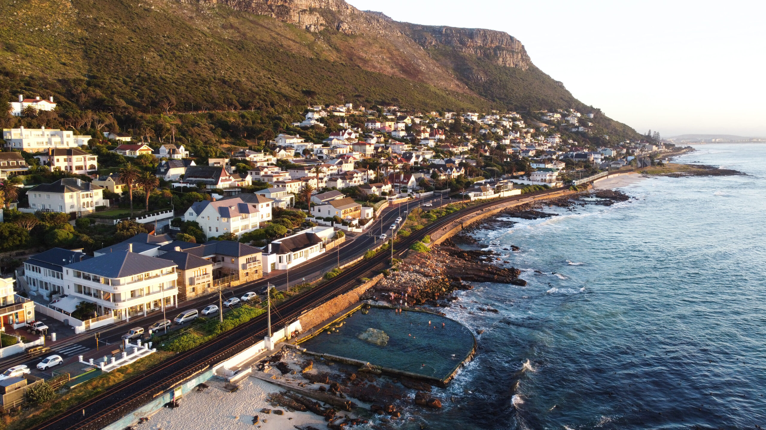 The Dalebrook Place heritage building set above the Dalebrook tidal pool, Kalk Bay seafront