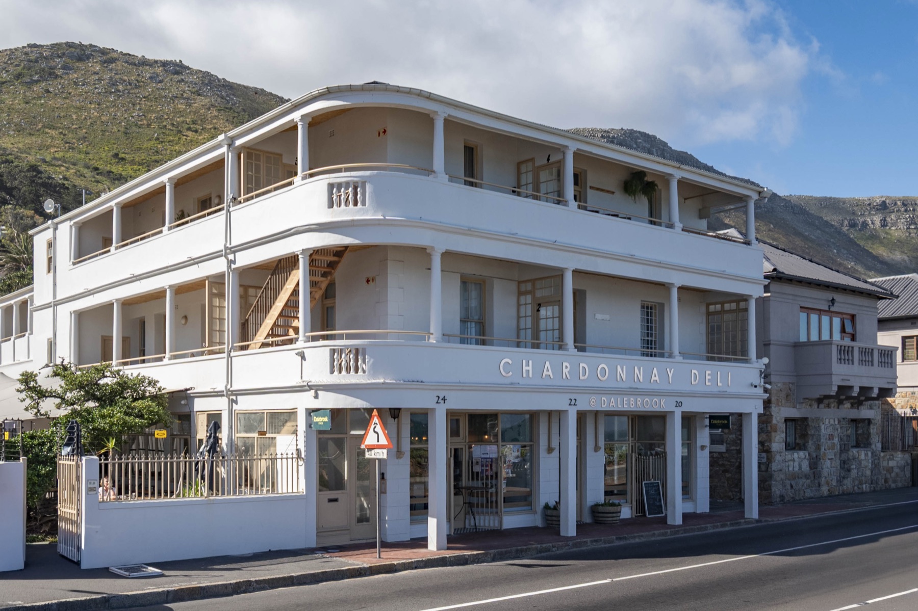 Chardonnay Deli storefront beneath the Dalebrook Place apartments in Kalk Bay